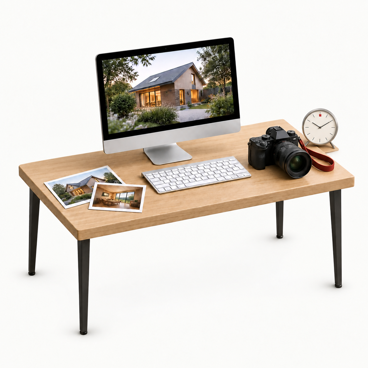 A miniature media desk with a computer, camera and signature clock