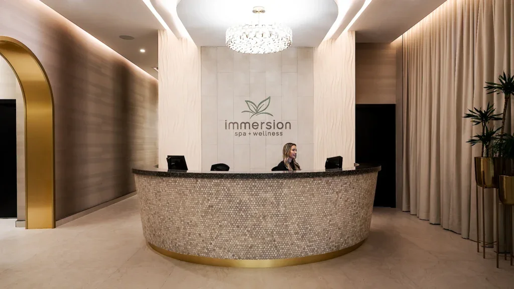 Woman sitting at Desk at Parksville Immersion Spa