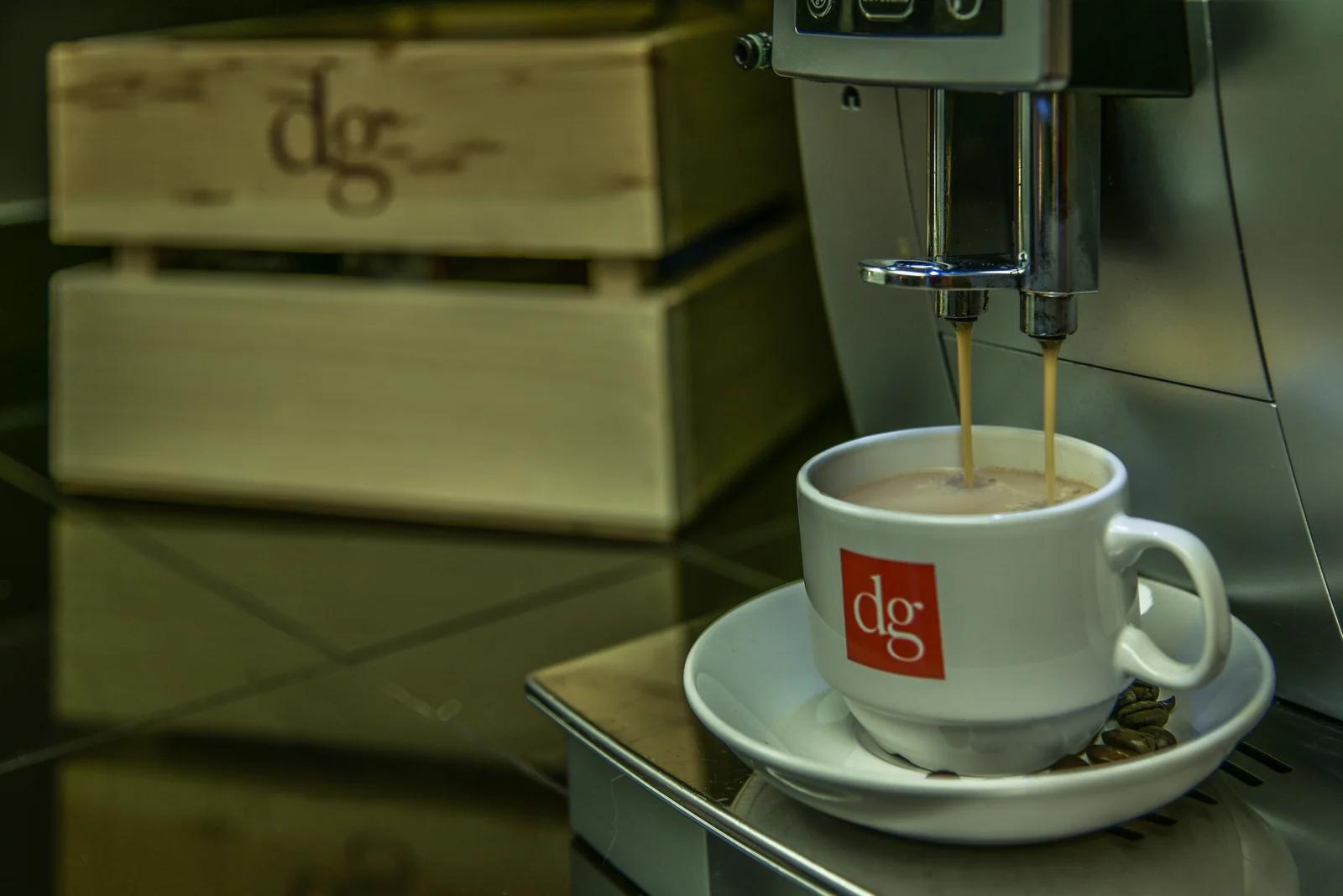 Dark espresso with rich crema pouring into a Gillette & Associates cup