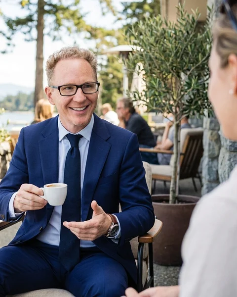 Derek Gillette sharing a coffee and conversation