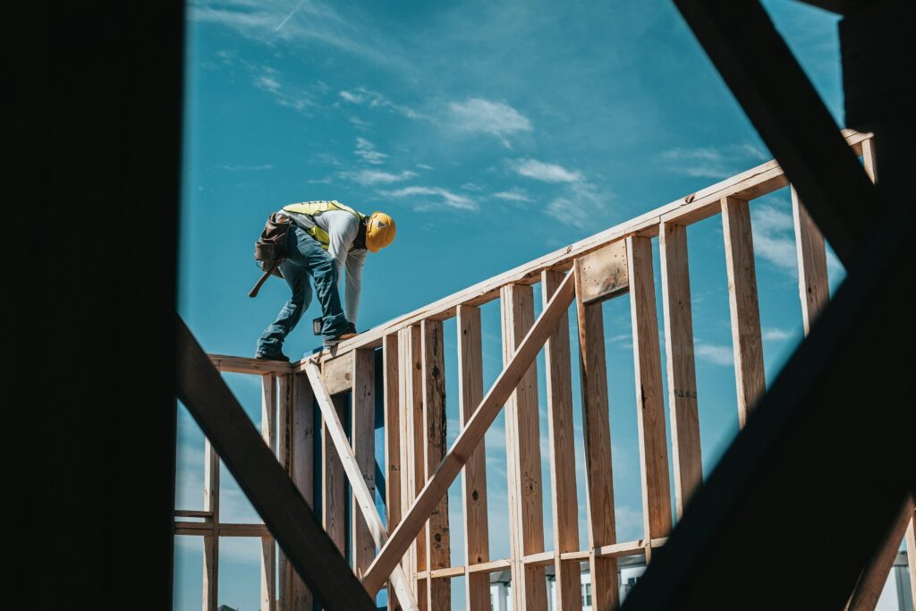 Construction worker building a custom new construction home